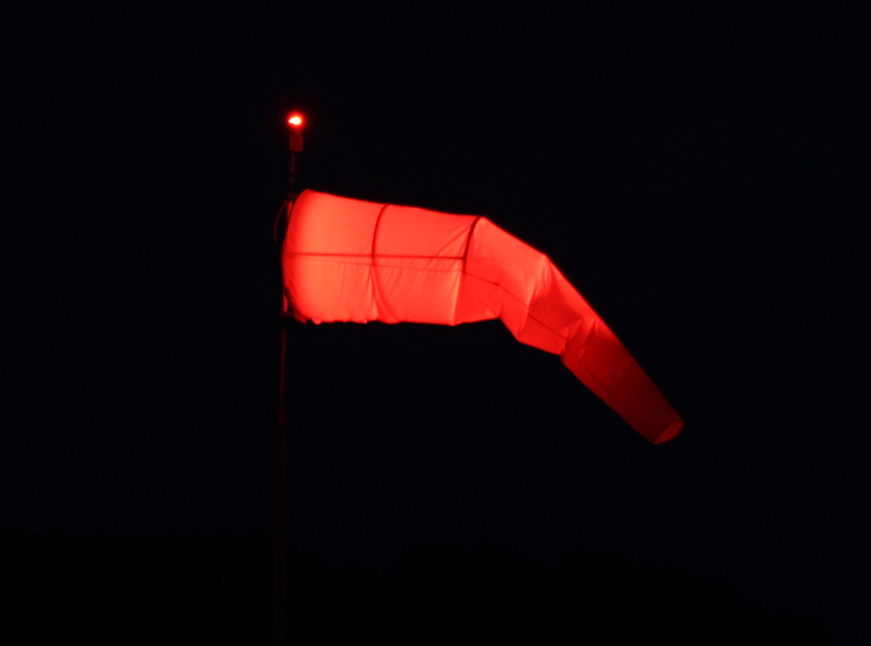 Pilot's view of solar power supply wind cone